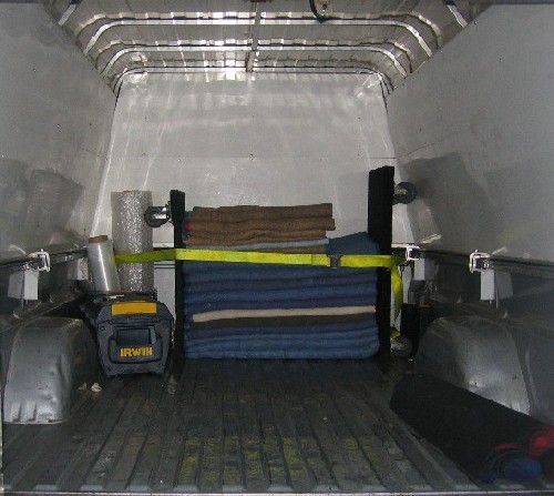 movingtruckinsideboxwithequipment